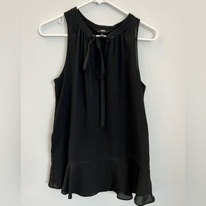 Black sleeveless blouse